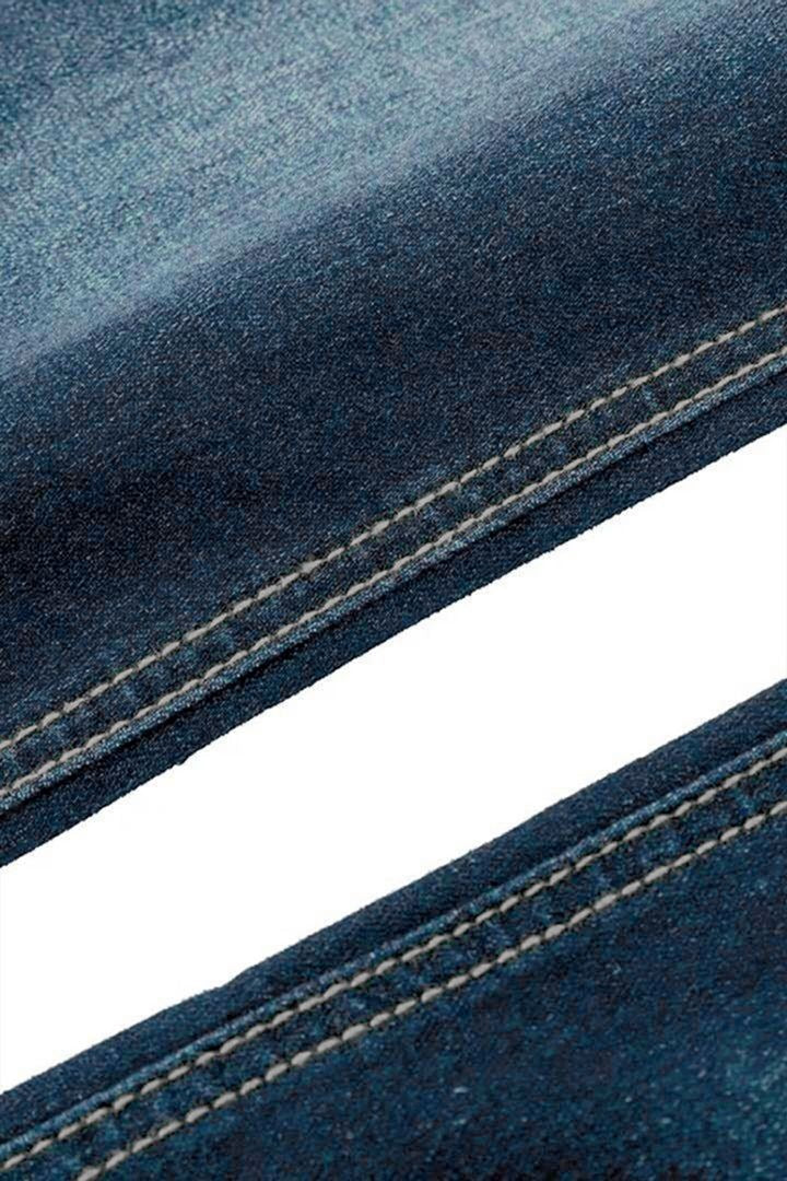 Jean vintage taille basse déchiré et boutonné