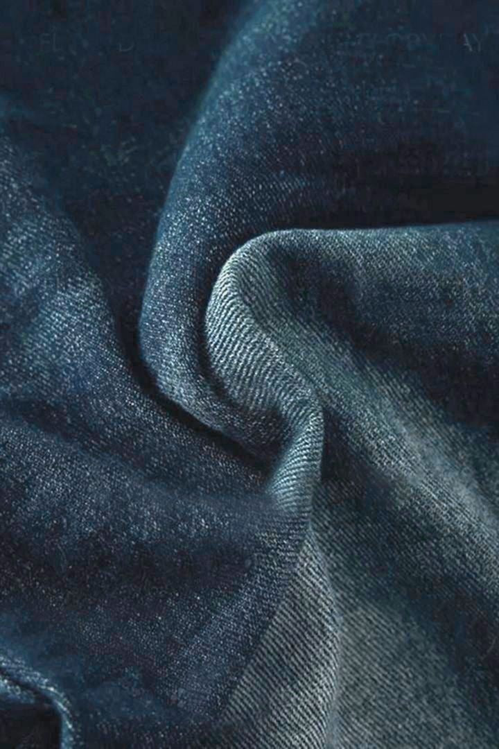 Jean vintage taille basse déchiré et boutonné