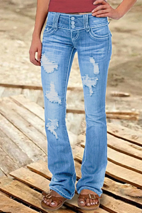 Jean vintage taille basse déchiré et boutonné