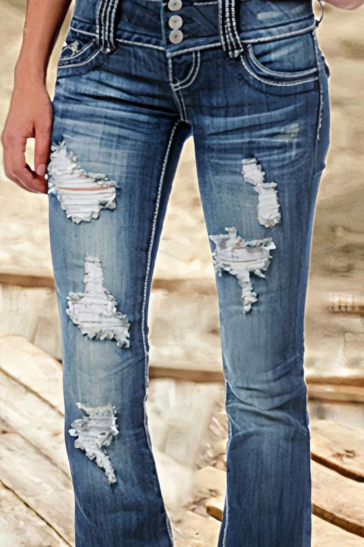 Jean vintage taille basse déchiré et boutonné