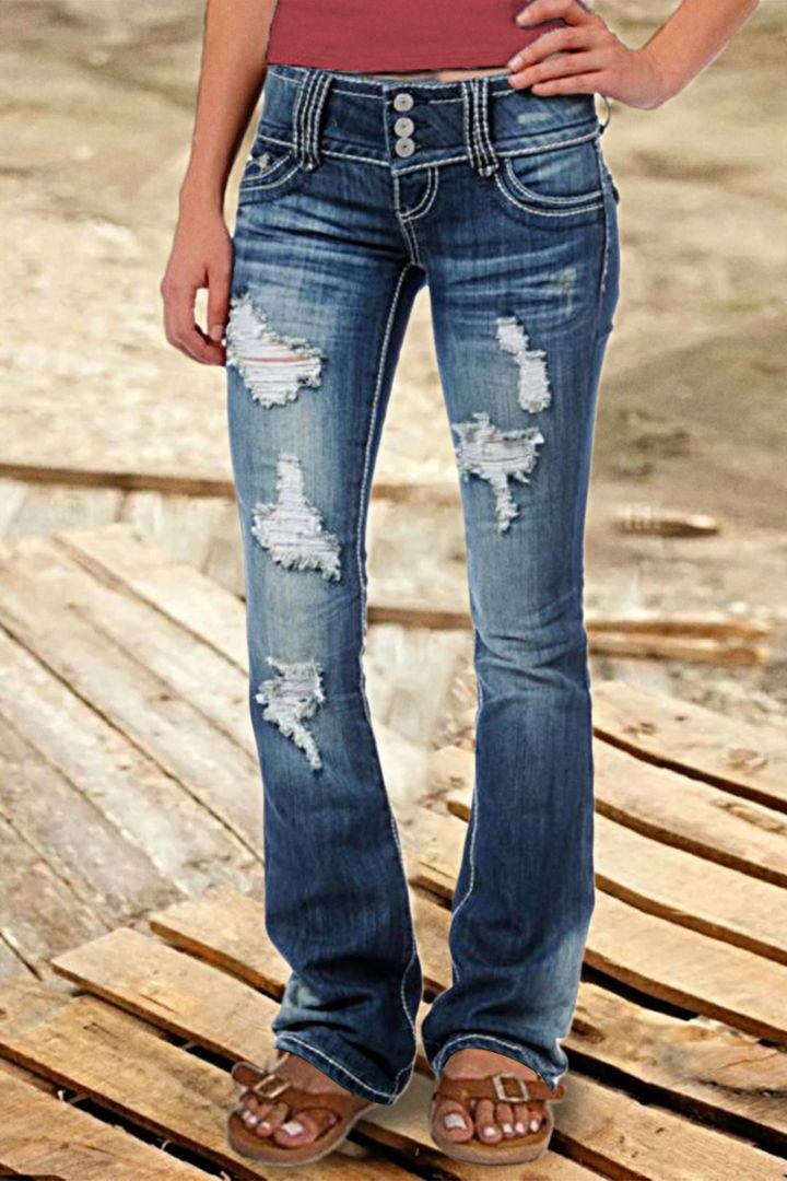 Jean vintage taille basse déchiré et boutonné