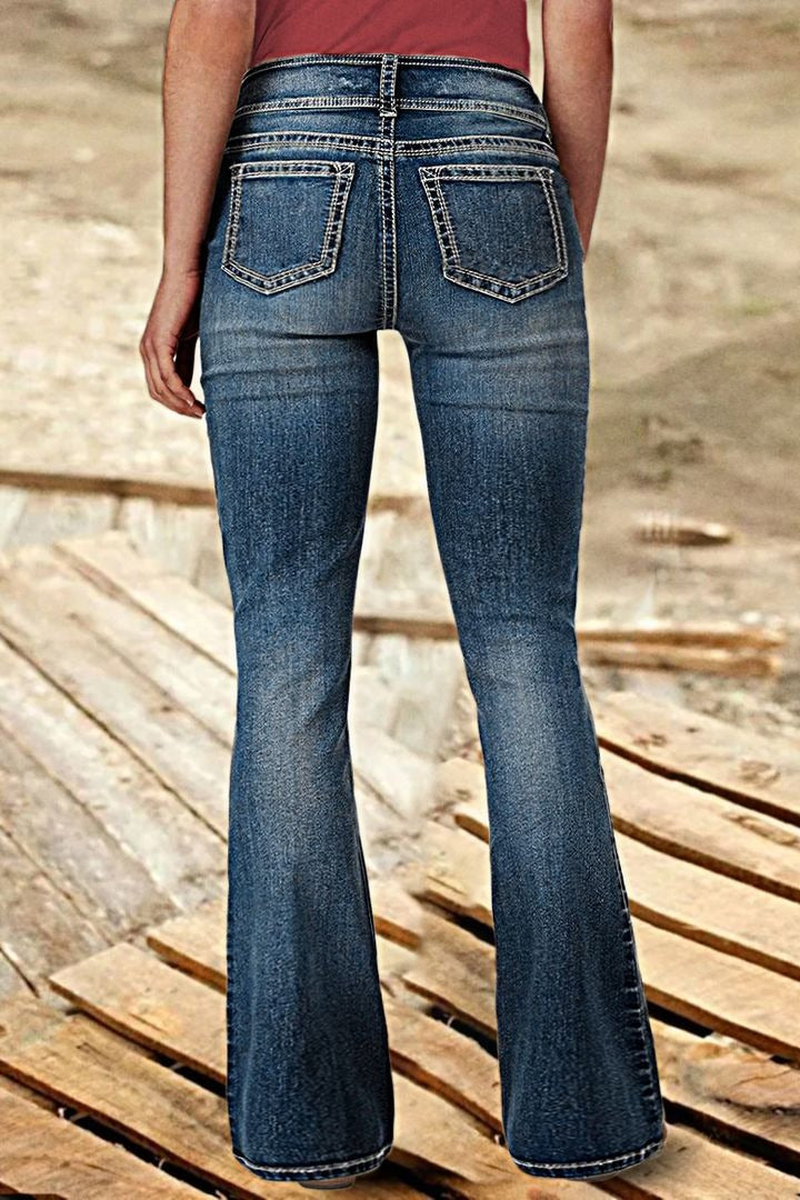 Jean vintage taille basse déchiré et boutonné